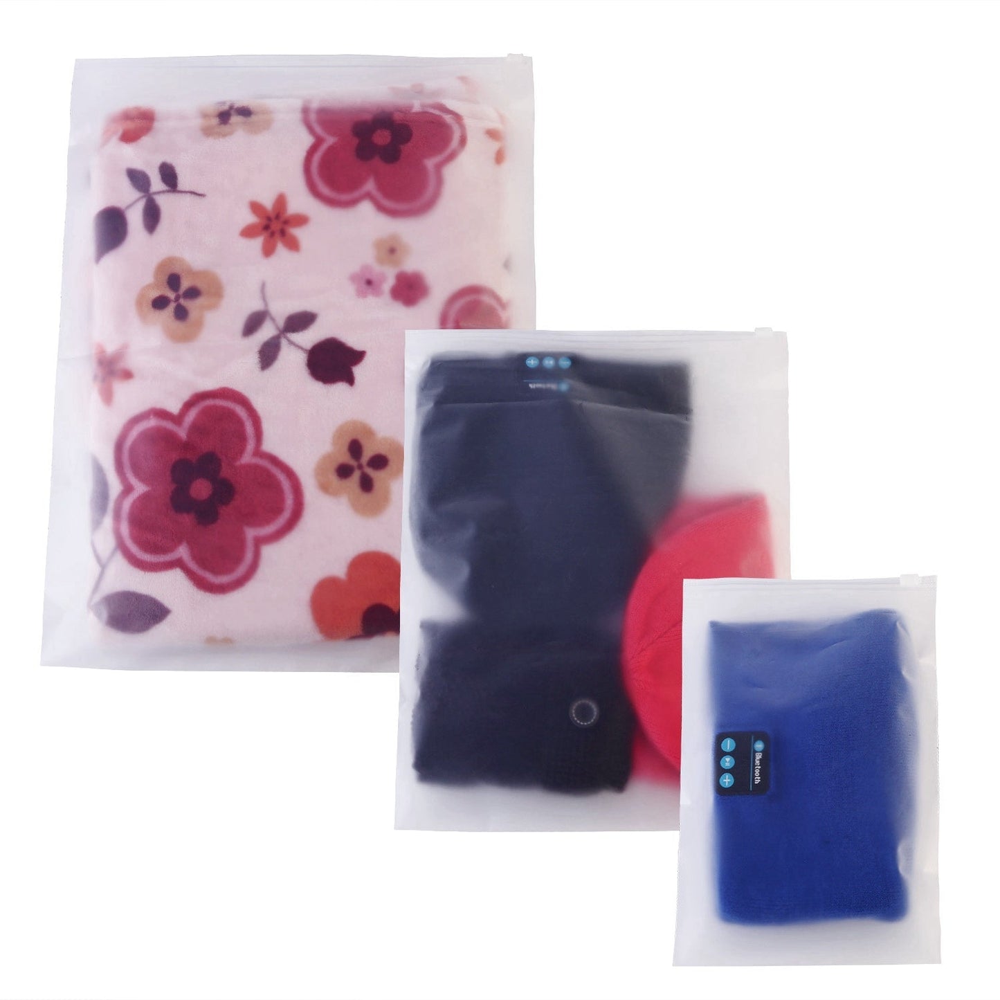 Clothing storage bags with floral, navy, and blue designs and zip tops