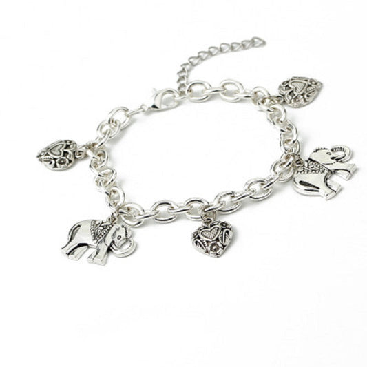 Silver charm bracelet with elephant, heart, and love-themed dangling charms