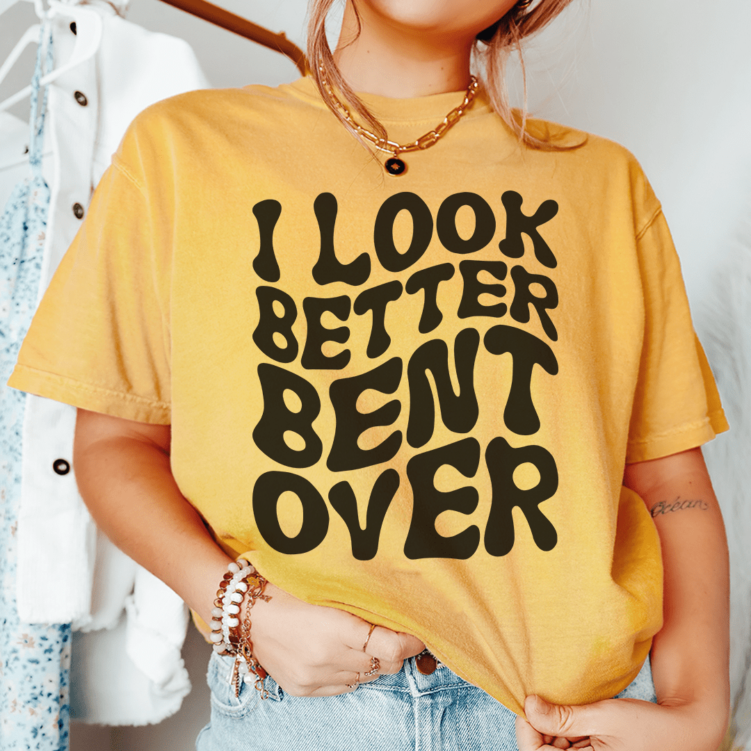 Mustard yellow T-shirt with centered black graphic and crew neckline