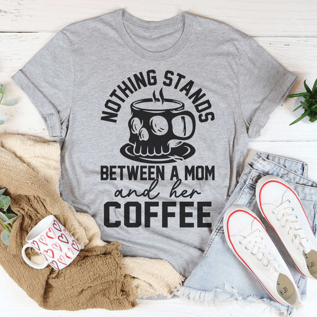 Gray heather mom coffee t-shirt with skull graphic and “Between a Mom and her Coffee” text