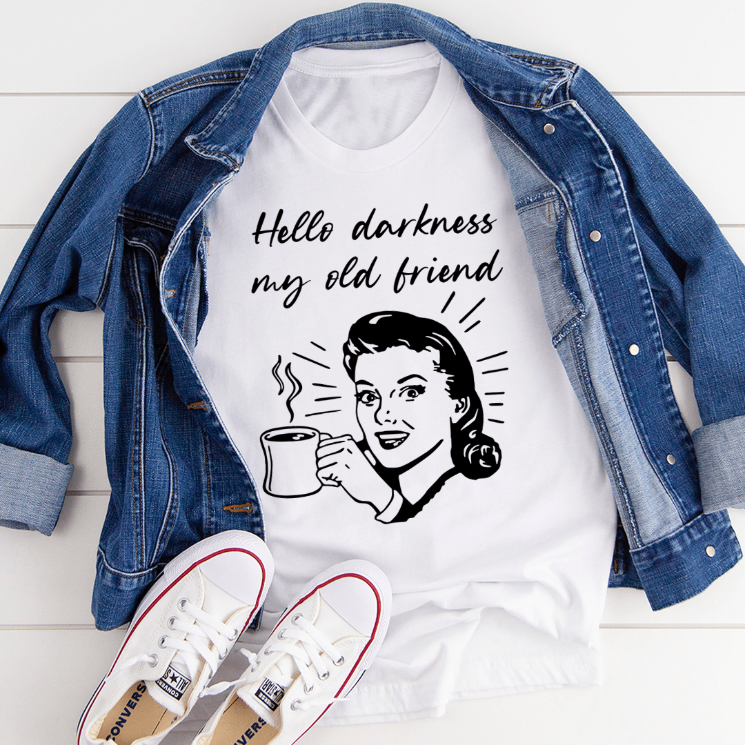 White crewneck T-shirt featuring script text and line-art woman with a steaming cup