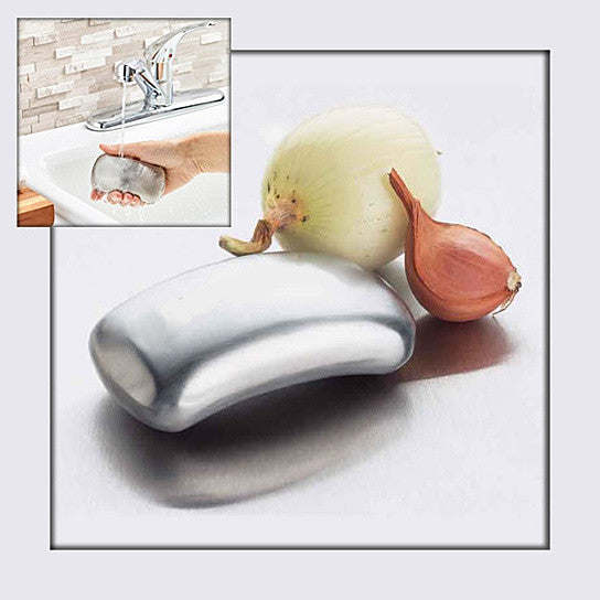 Odor remover bar with onion and garlic pieces beside it, plus small sink inset