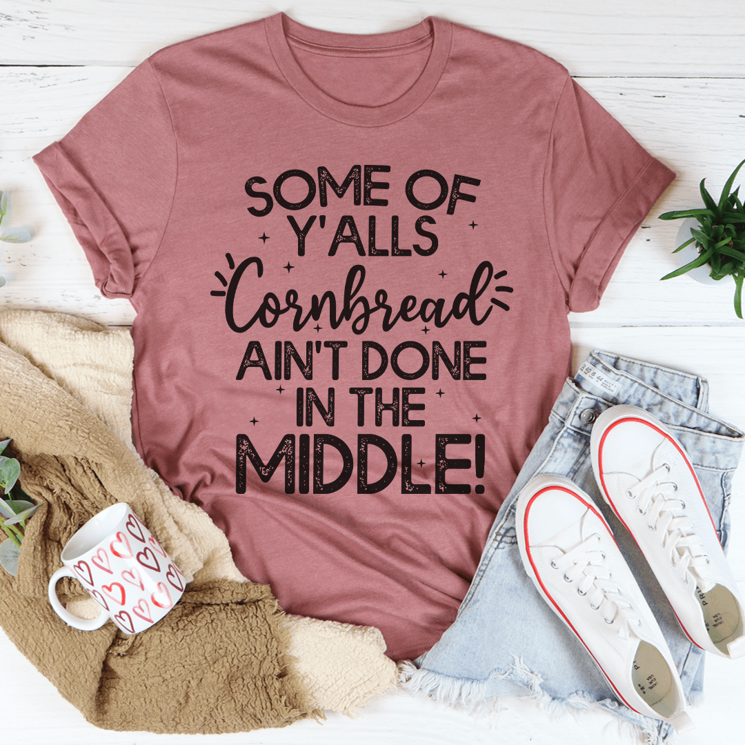 Mauve crewneck T-shirt with 'Cornbread Ain't Done In The Middle' graphic