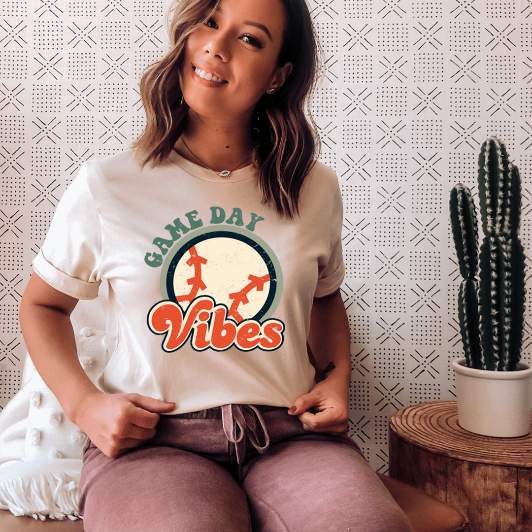 White Game Day Vibes graphic T-shirt worn by model with short sleeves