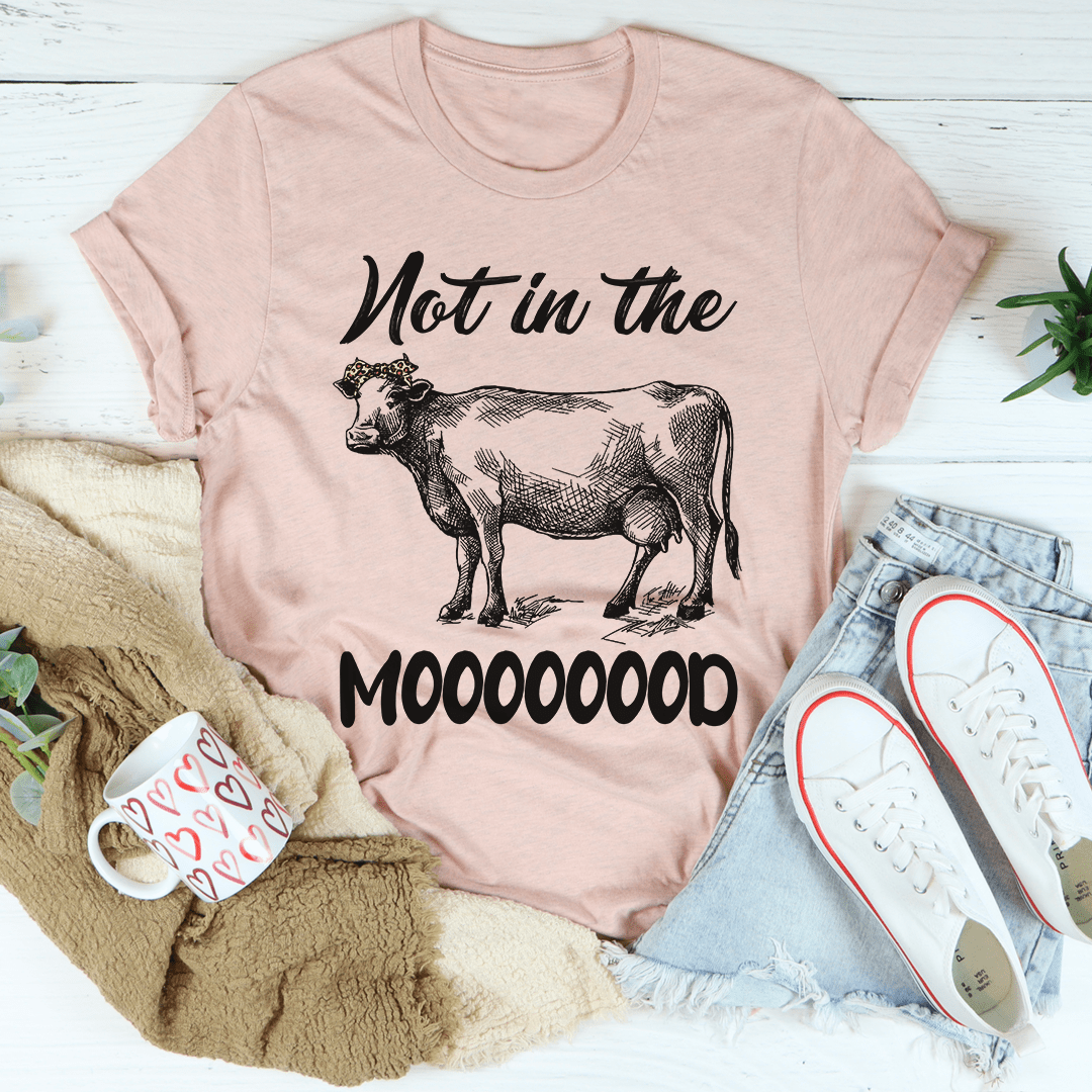 Mauve T-shirt with cow graphic and 'Not in the Mood' text; crew neck.