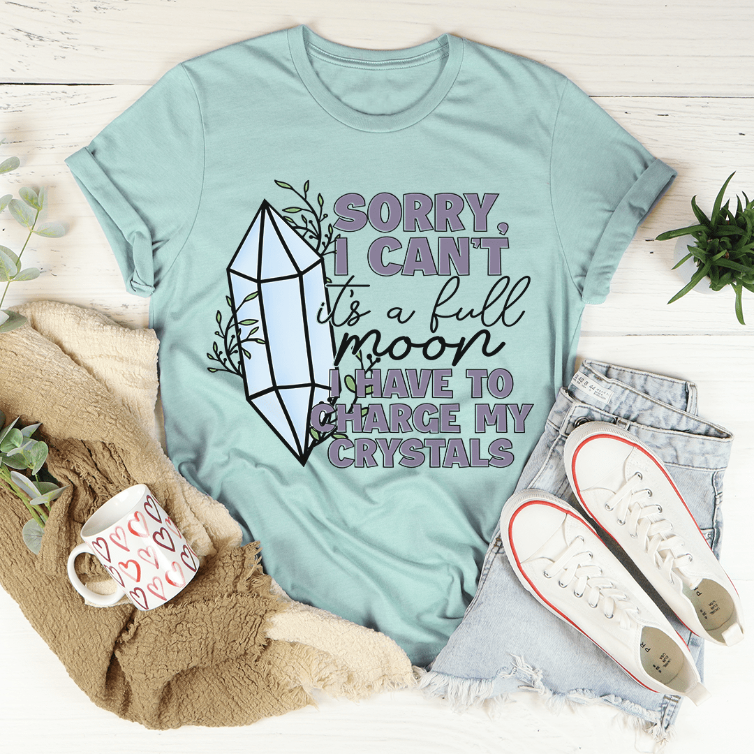 Teal T-shirt with crystal graphic and 'SORRY, I CAN'T... CHARGE MY CRYSTALS'.