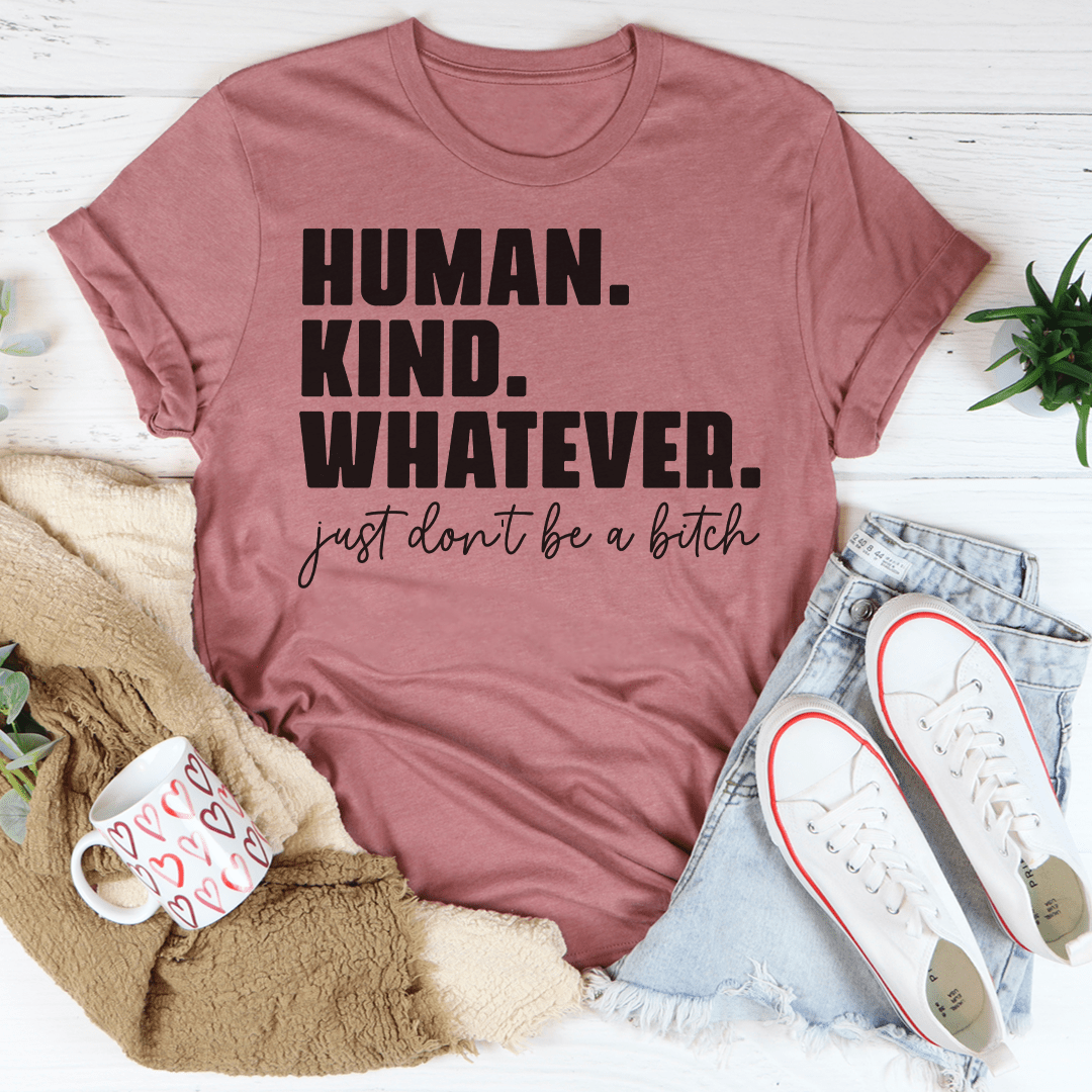 Dusty rose graphic t-shirt with bold 'HUMAN. KIND. WHATEVER.' and script slogan