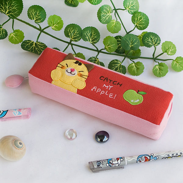 Embroidered pencil pouch with red front, pink sides, cat and green apple appliques