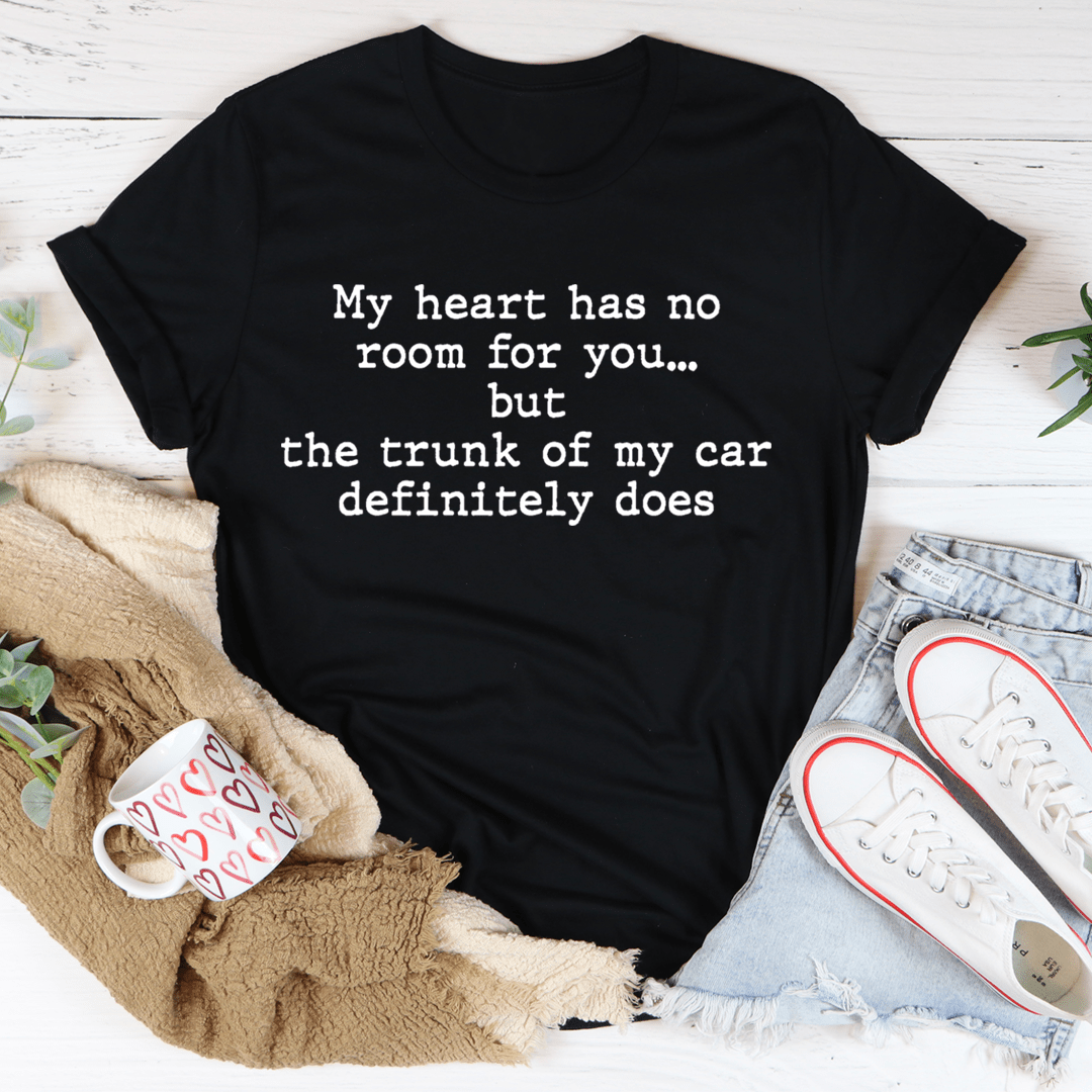Black crewneck T-shirt with centered front graphic text: "My heart has no room for you..."