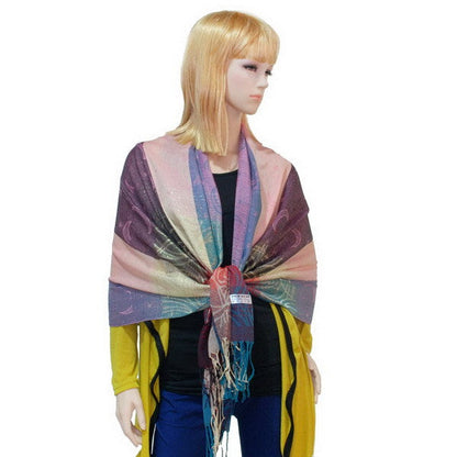 Pashmina shawl on model in purple, blue, and pink with tassel fringe