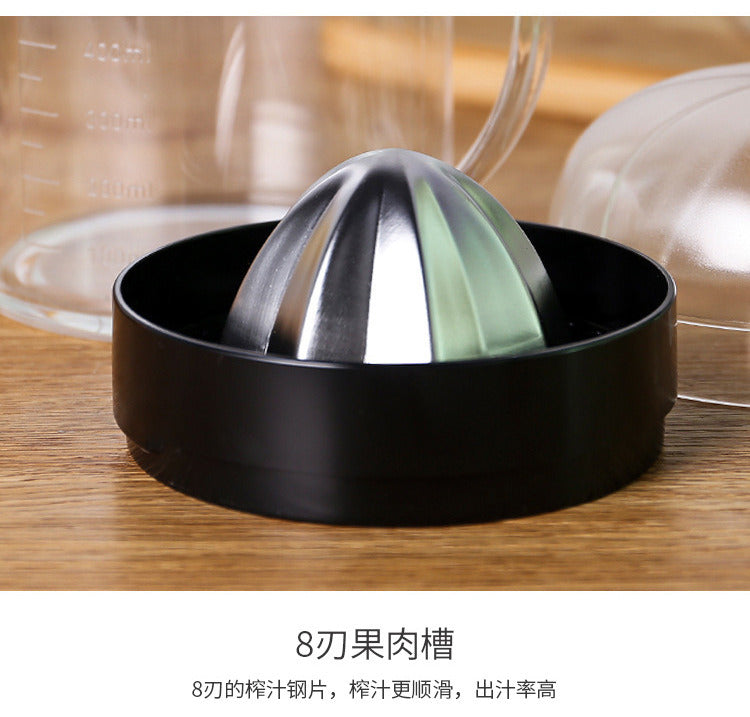 Black citrus strainer cup with stainless ribbed cone reamer for manual juicing