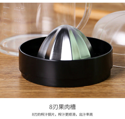 Black citrus strainer cup with stainless ribbed cone reamer for manual juicing