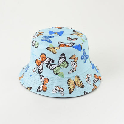 Light blue fisherman bucket hat with colorful butterflies and insects print
