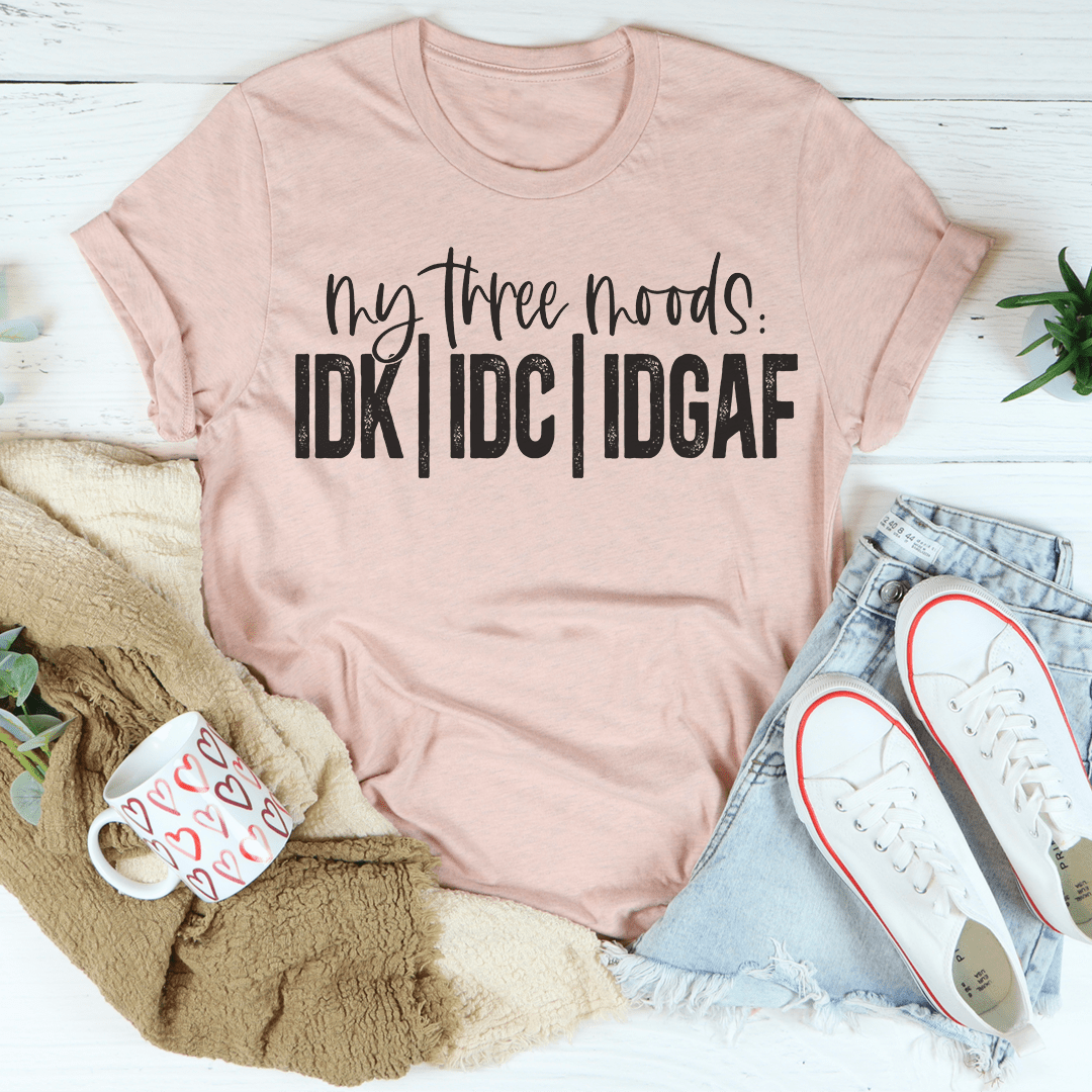 Light mauve crewneck T-shirt with 'My Three Moods' graphic: IDK IDC IDGAF