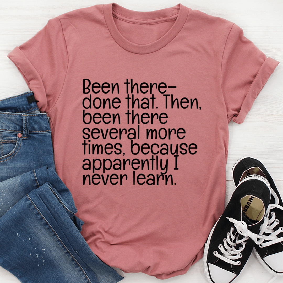 Mauve short-sleeve T-shirt with black quote graphic on the front