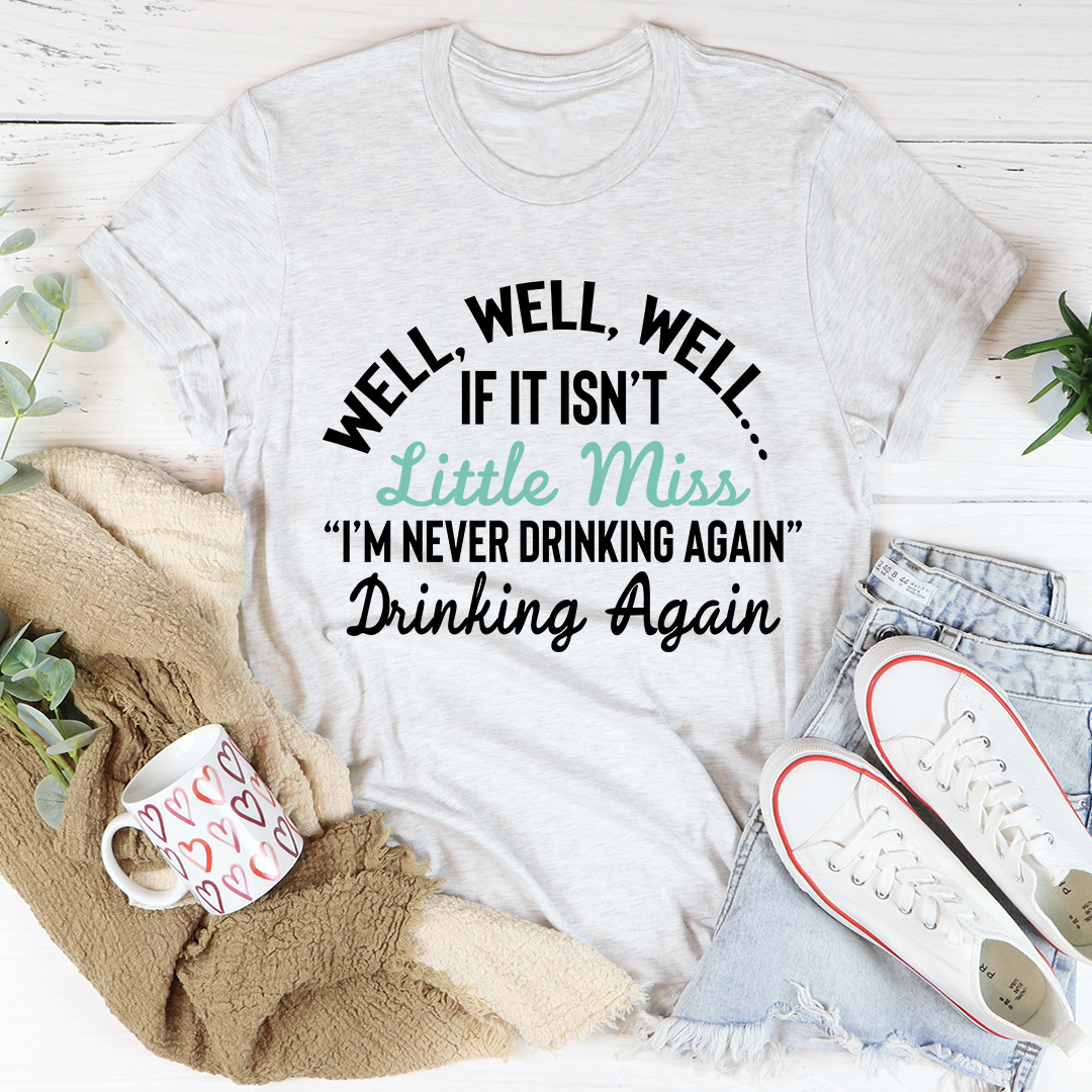 Ash gray V-neck T-shirt with black 'Little Miss' slogan and 'I'm never drinking again'