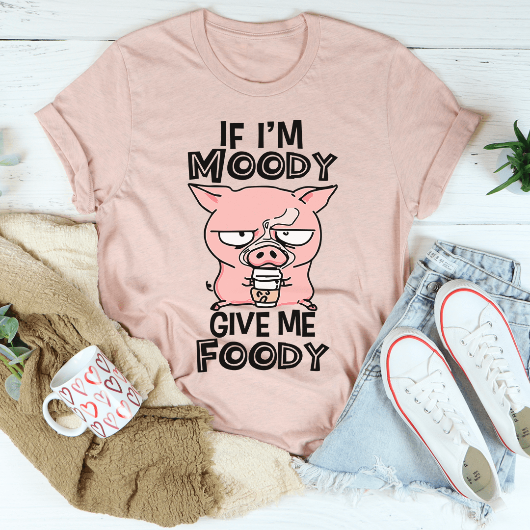 Mauve/pink T-shirt with pig face graphic and bold "Give Me Foody" text