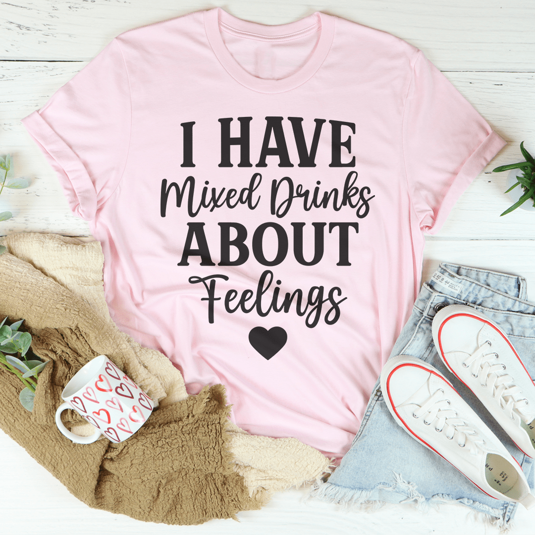 Pink crewneck t-shirt with 'I HAVE Mixed Drinks ABOUT Feelings' heart print