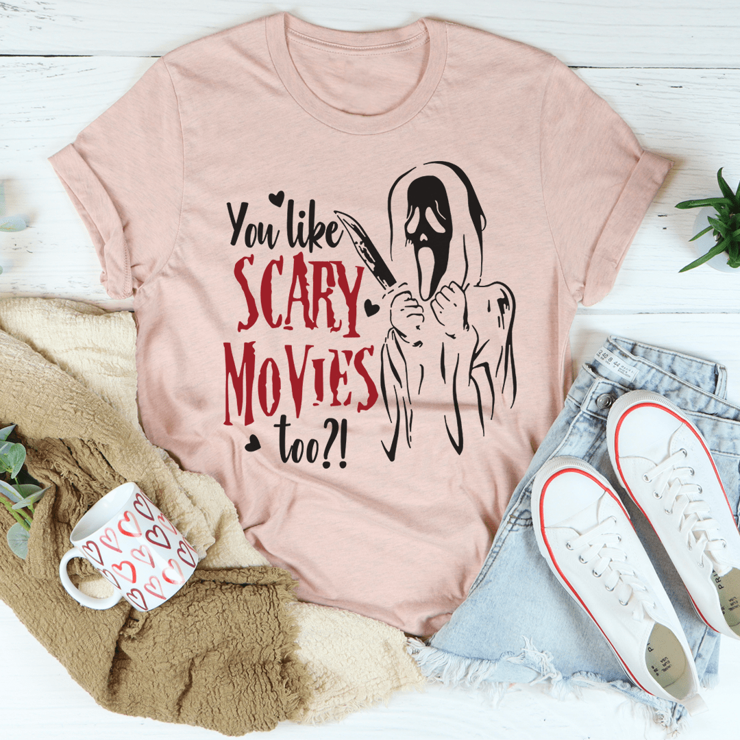 Blush pink graphic T-shirt with spooky ghost and red text print