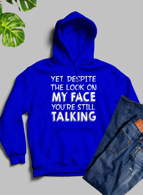 Royal blue pullover hoodie with hood, kangaroo pocket, and bold “YET, DESPITE…” print.