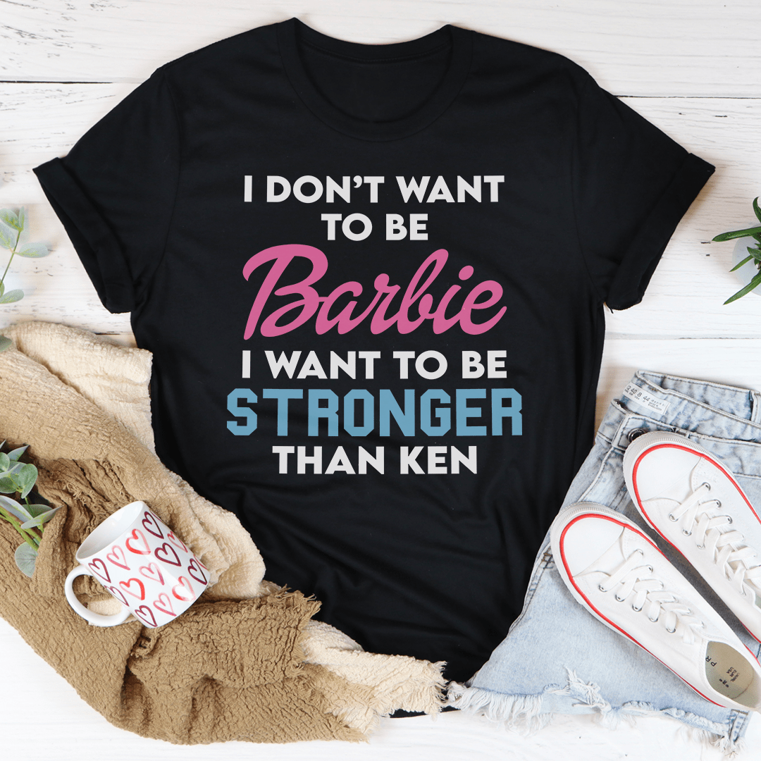 Black crew-neck T-shirt with Barbie slogan: STRONGER THAN KEN.