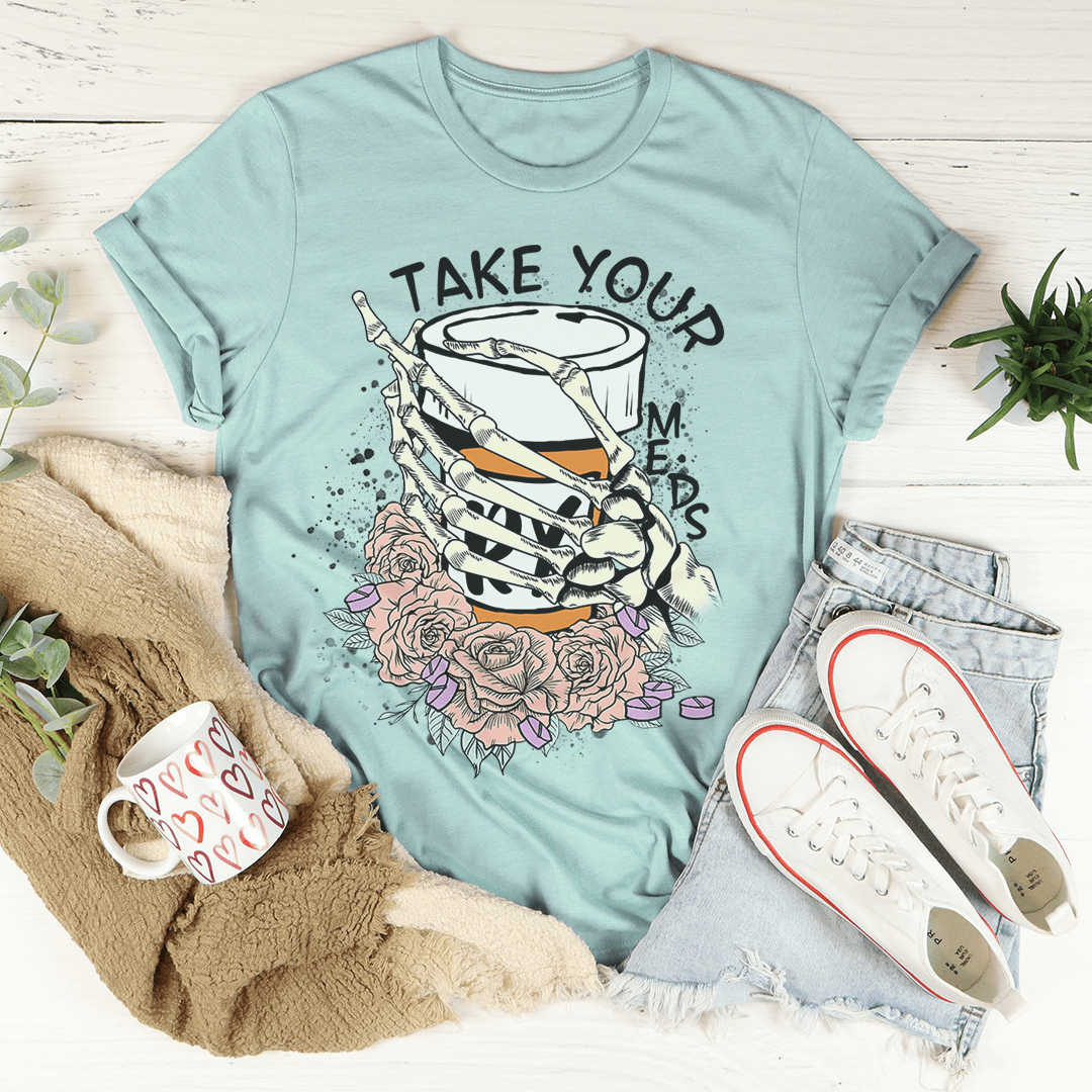 Dusty blue crew-neck T-shirt with skeleton hand and roses floral graphic.
