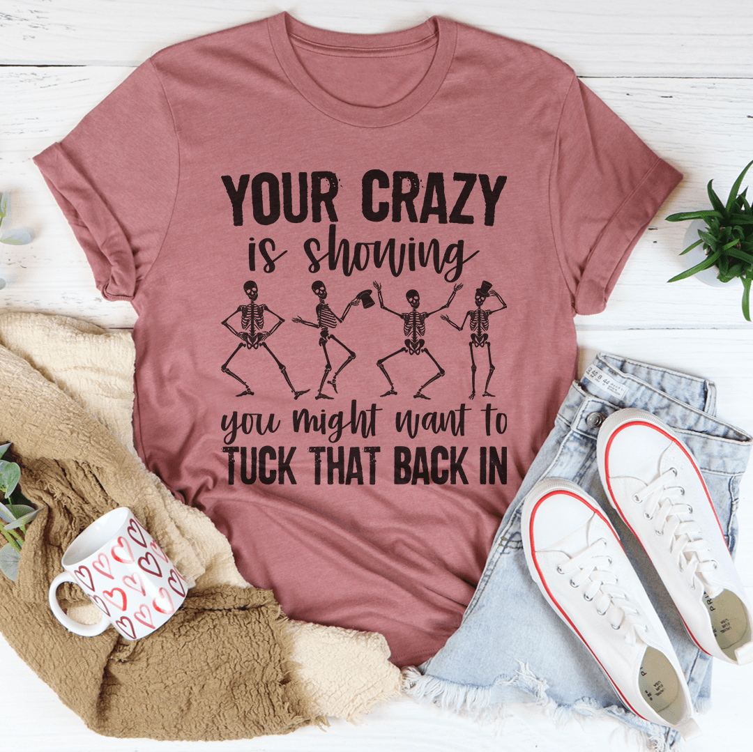 Mauve graphic t-shirt with skeleton dancers and 'Tuck that back in' text.