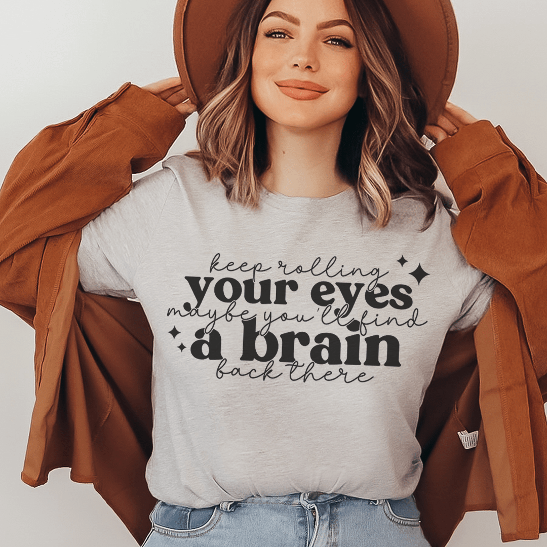 Light gray T-shirt with large white typographic slogan graphic on the front