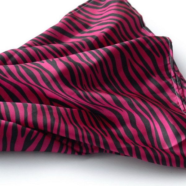 Zebra-print silk scarf close-up, fuchsia and dark pink wavy stripes