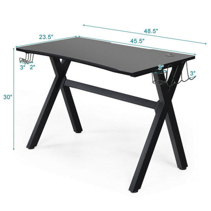 Black gaming desk with headphone hook and under-desk cup holder, size shown