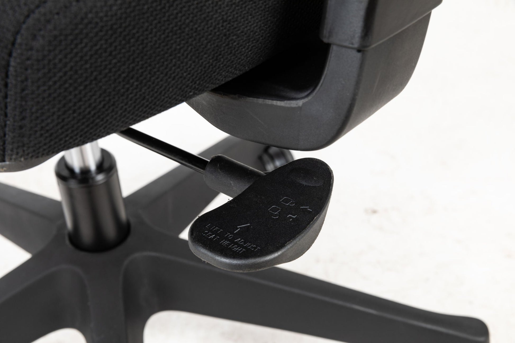 Office chair armrest and underside control lever with adjustment plate