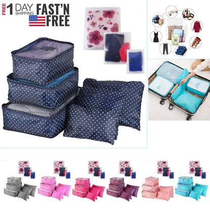 Navy polka dot travel packing cube set with matching zip pouches and clear mesh bags