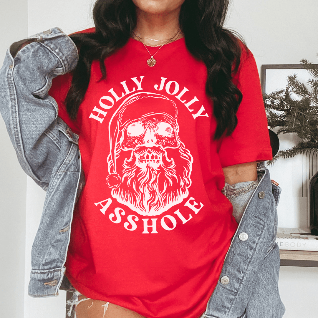 Red graphic T-shirt with large white Santa face and 'Holly Jolly Asshole' text