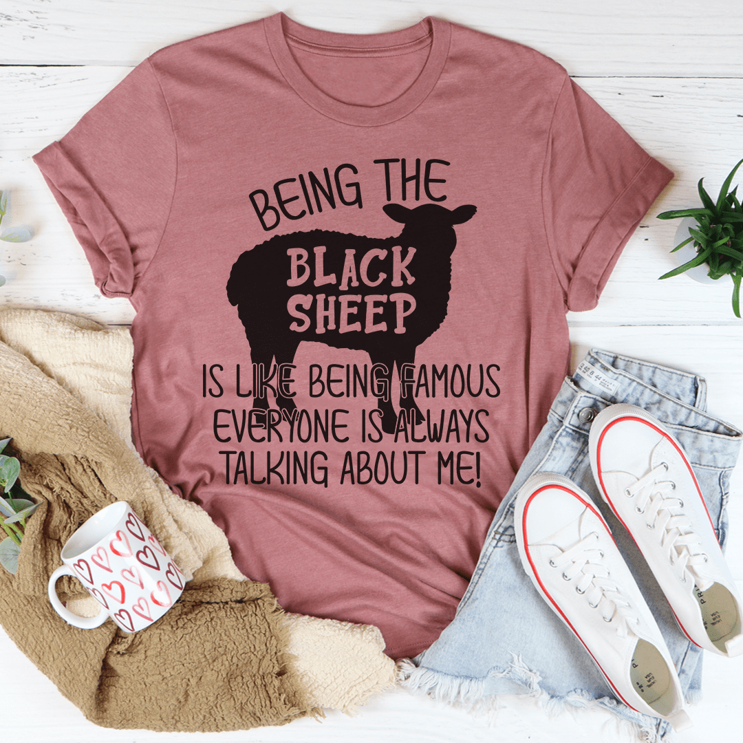 Mauve crewneck T-shirt with “Being the Black Sheep” lettering and sheep graphic