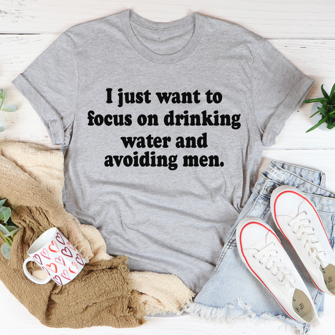 Heather gray crewneck graphic T-shirt with black text: focus on drinking water and avoiding men