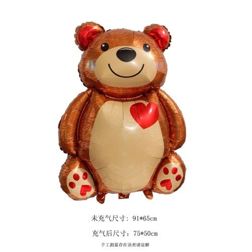 Brown bear foil balloon with red heart on white belly and red paw prints