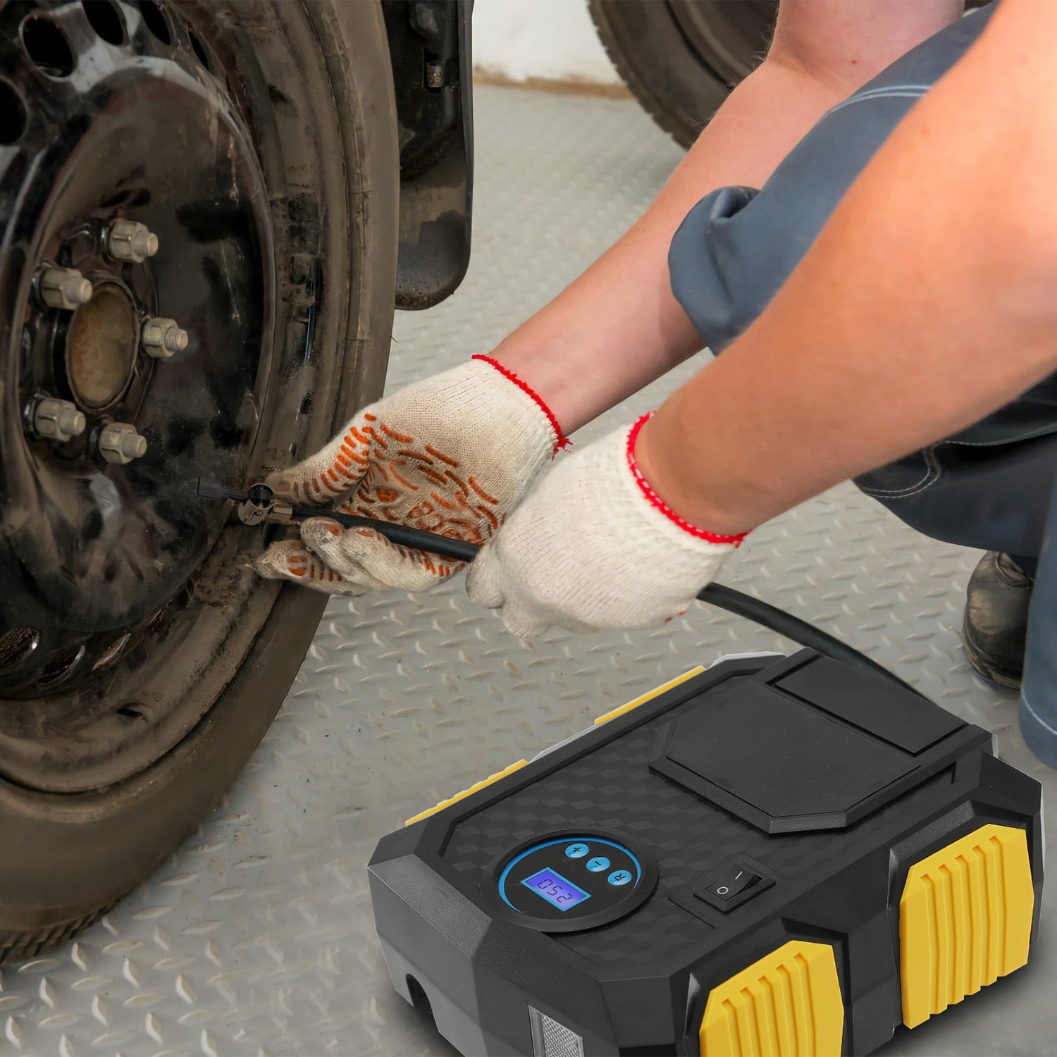 12V tire inflator compressor, yellow-and-black body with hose and LCD screen