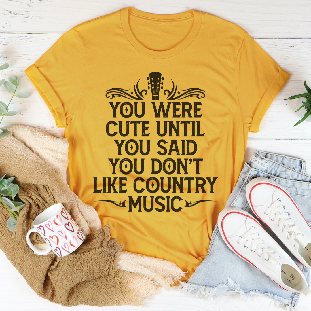 Mustard crew neck T-shirt with centered black country music quote graphic