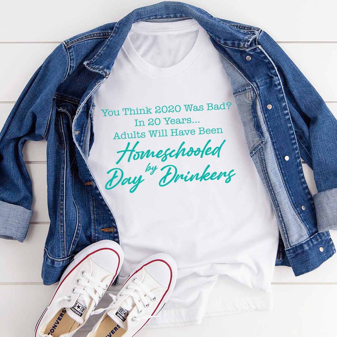 White T-shirt with homeschool day drinkers graphic slogan in teal and green