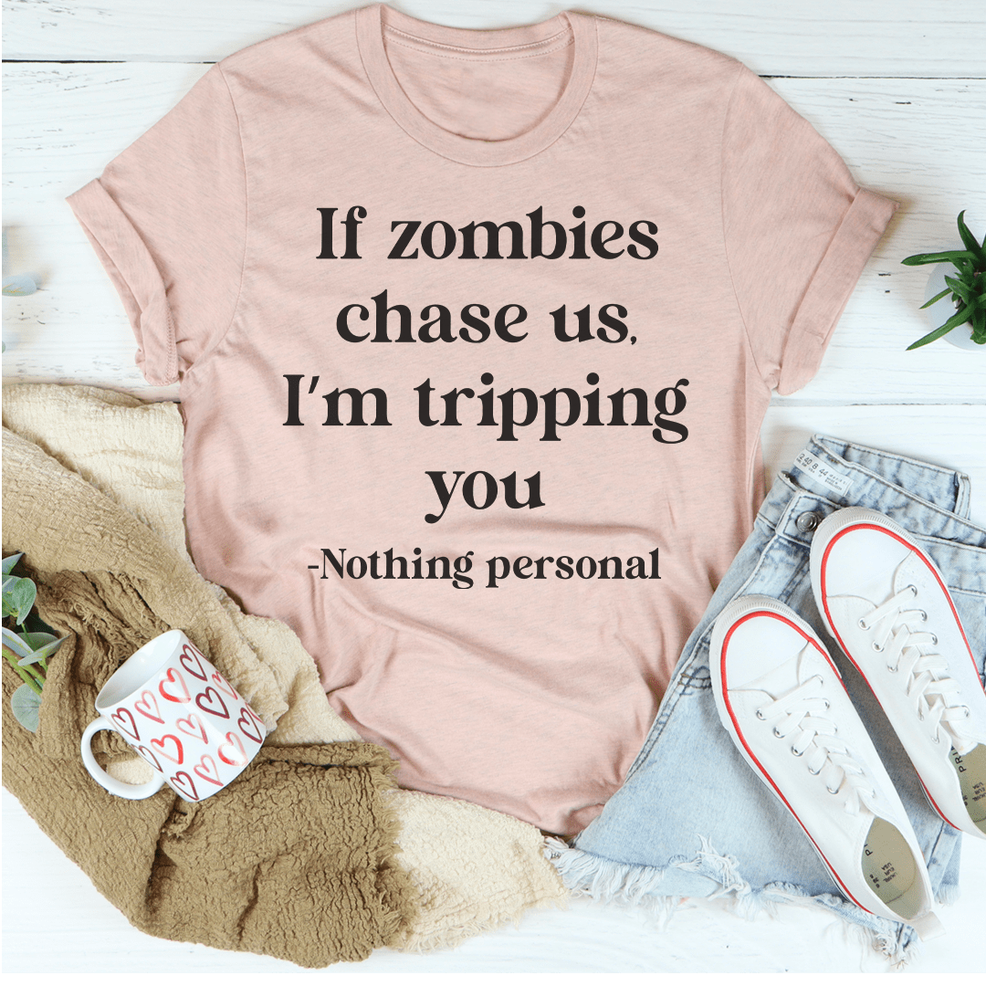 Heather prism peach T-shirt with quote text: If zombies chase us, I'm tripping you.