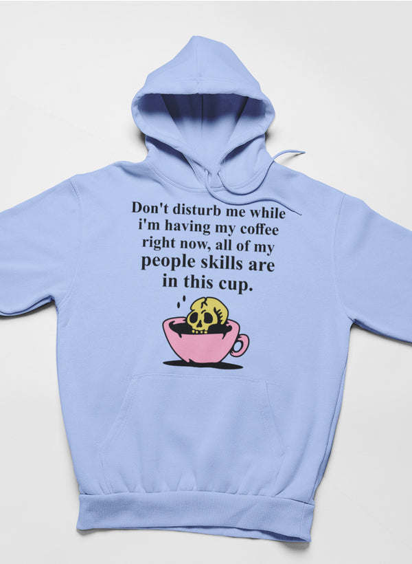 Heather blue hoodie with “Don’t disturb me” text and skull coffee cup graphic