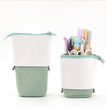Telescopic stationery case with zipper, white top and mint corduroy bottom, holds pens