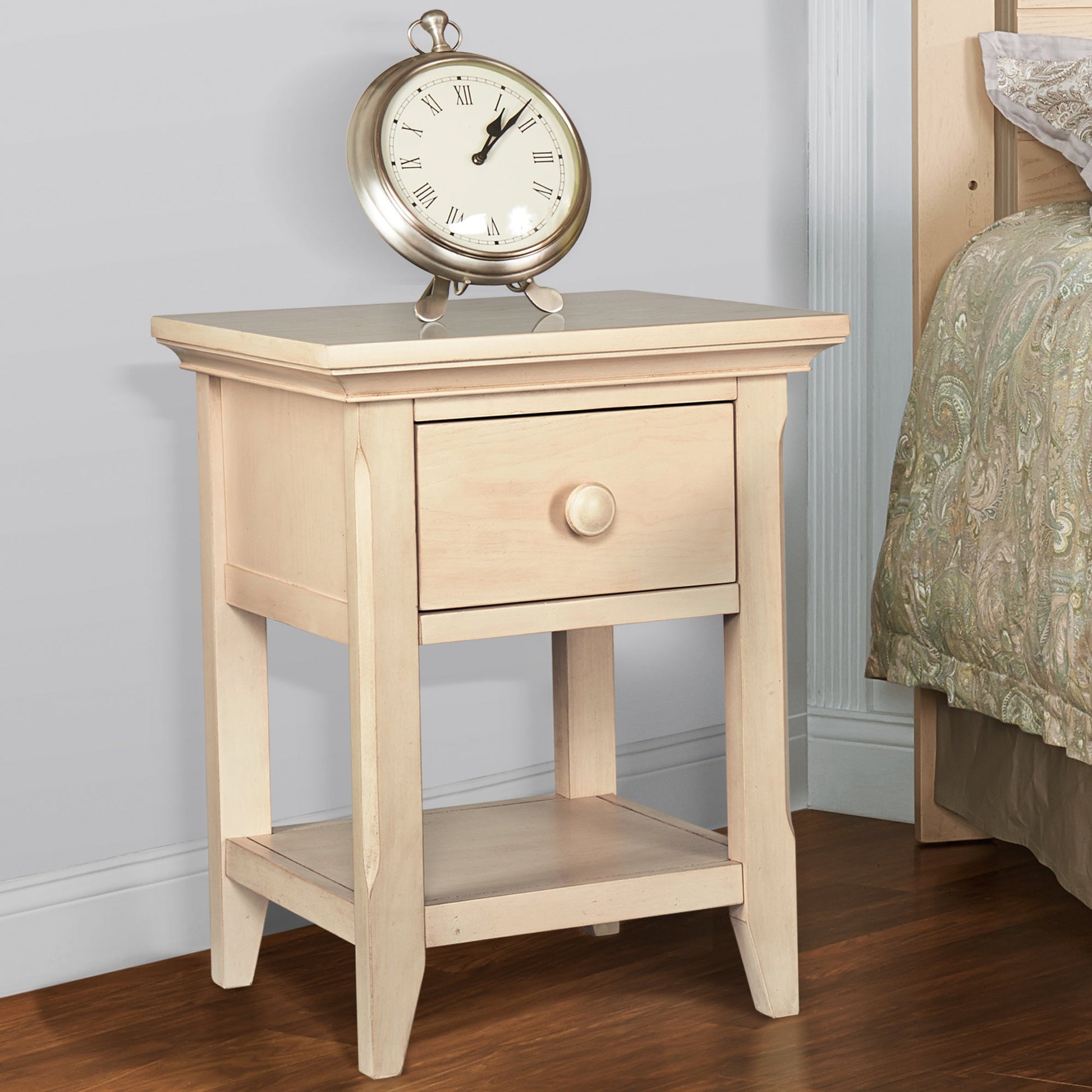 Sandstone nightstand with one drawer and lower shelf; round knob, classic panel sides.