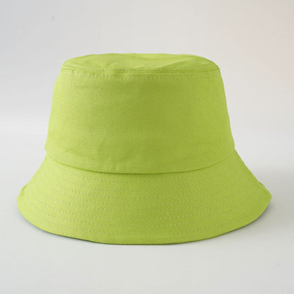 Lime green bucket fisherman hat with wide brim and stitched side panels