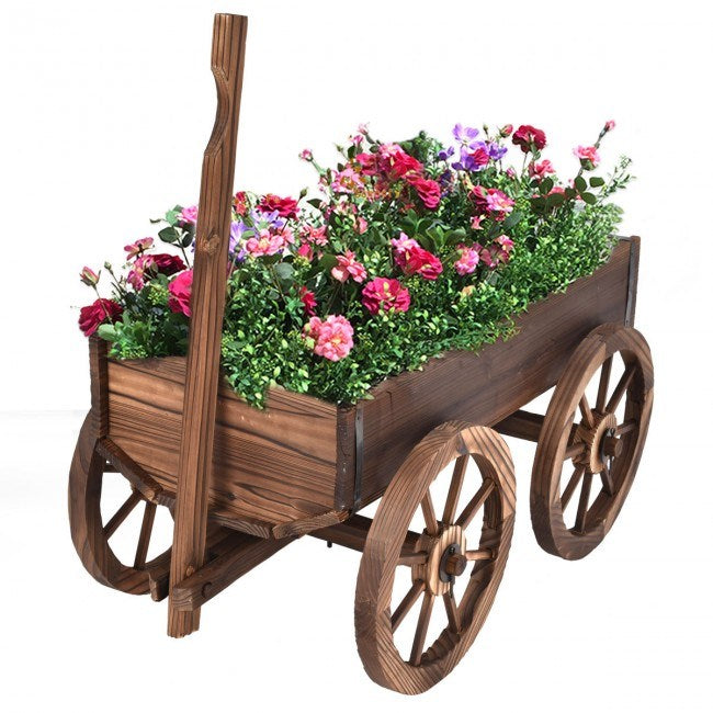Wood wagon planter pot stand with wheels, filled with colorful flowers