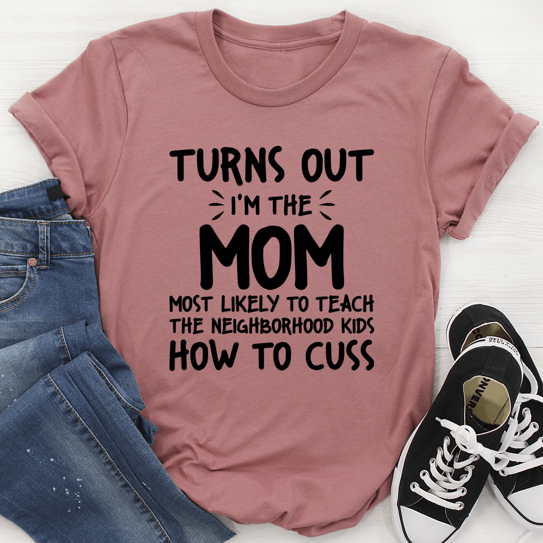 Mauve pink graphic T-shirt with 'Turns out' and 'How to cuss' text design