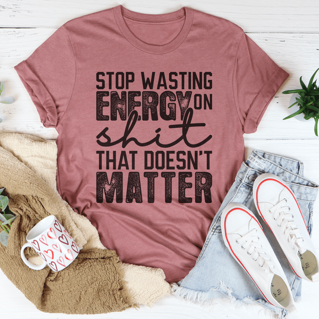 Mauve graphic T-shirt with bold slogan print on front
