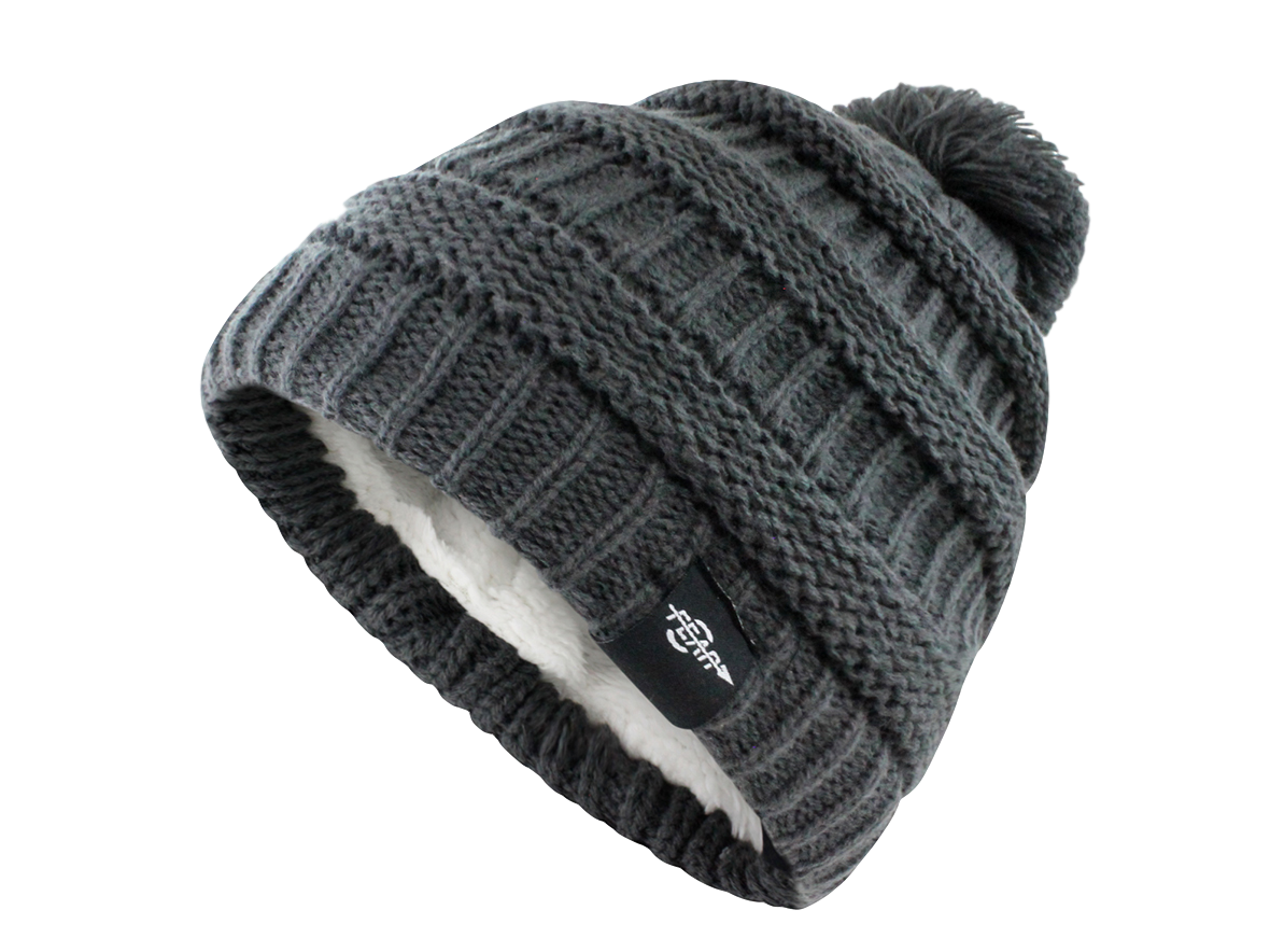 Grey cable knit beanie with pom-pom and plush white lining, ribbed cuff