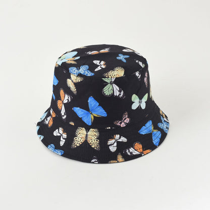 Black bucket hat with bright butterfly collage print
