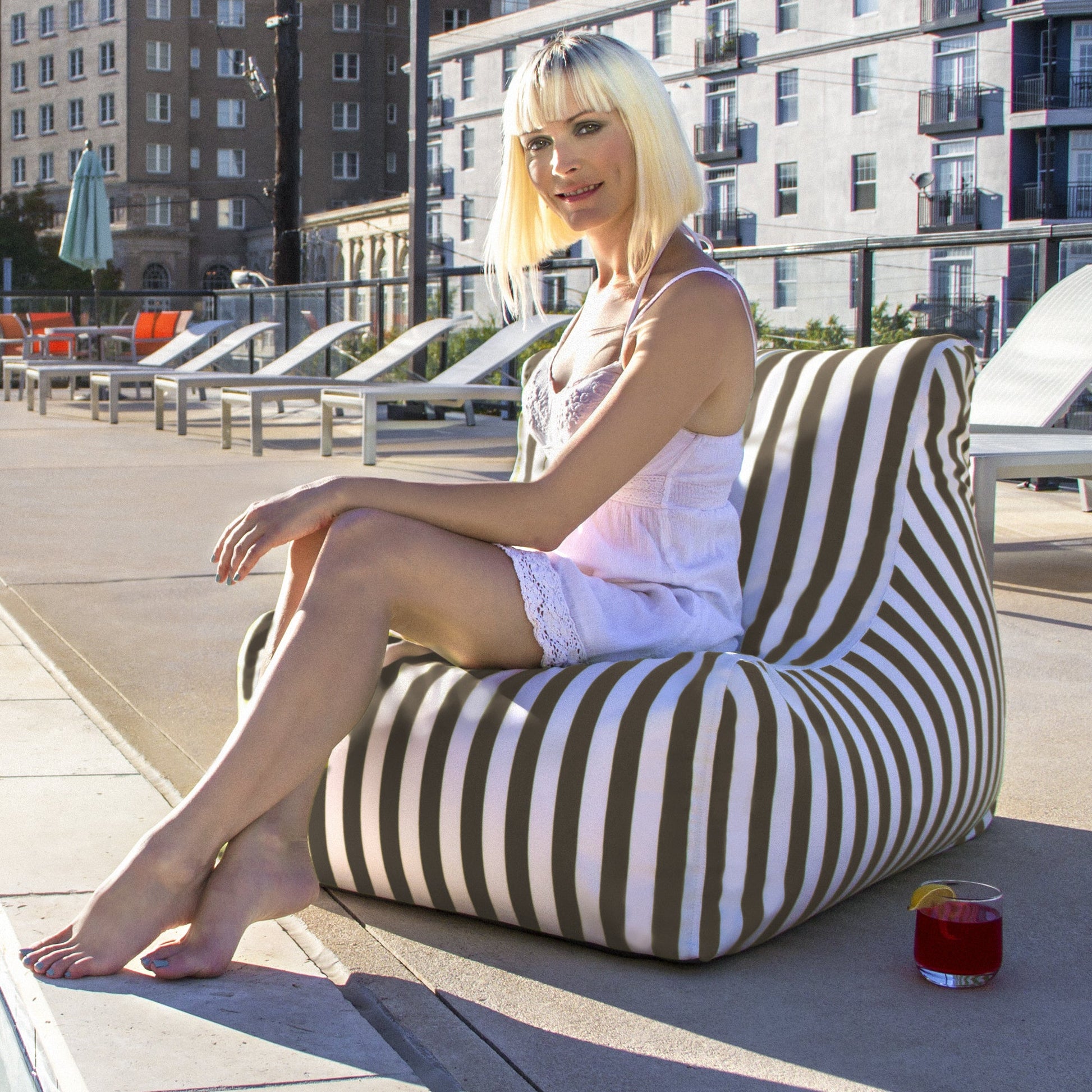 Outdoor bean bag chair, taupe-and-cream striped fabric with wide armrests